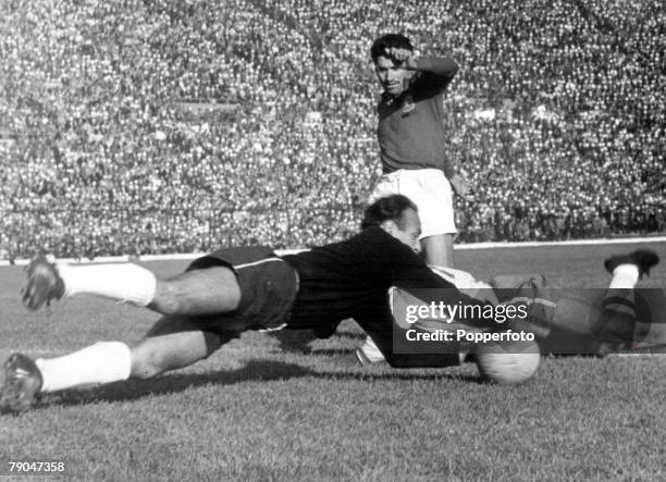 World Cup Semi-Final Santiago, Chile, 13th June Brazil 4 v Chile 2, Chilean goalkeeper Escutti dives to save from Brazil's Garrincha during their...
