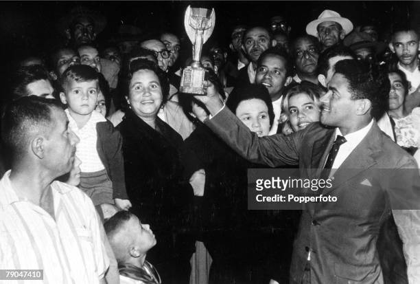 World Cup Finals, Chile, Brazil's Garrincha on return from Chile with the Jules Rimet trophy after the Final