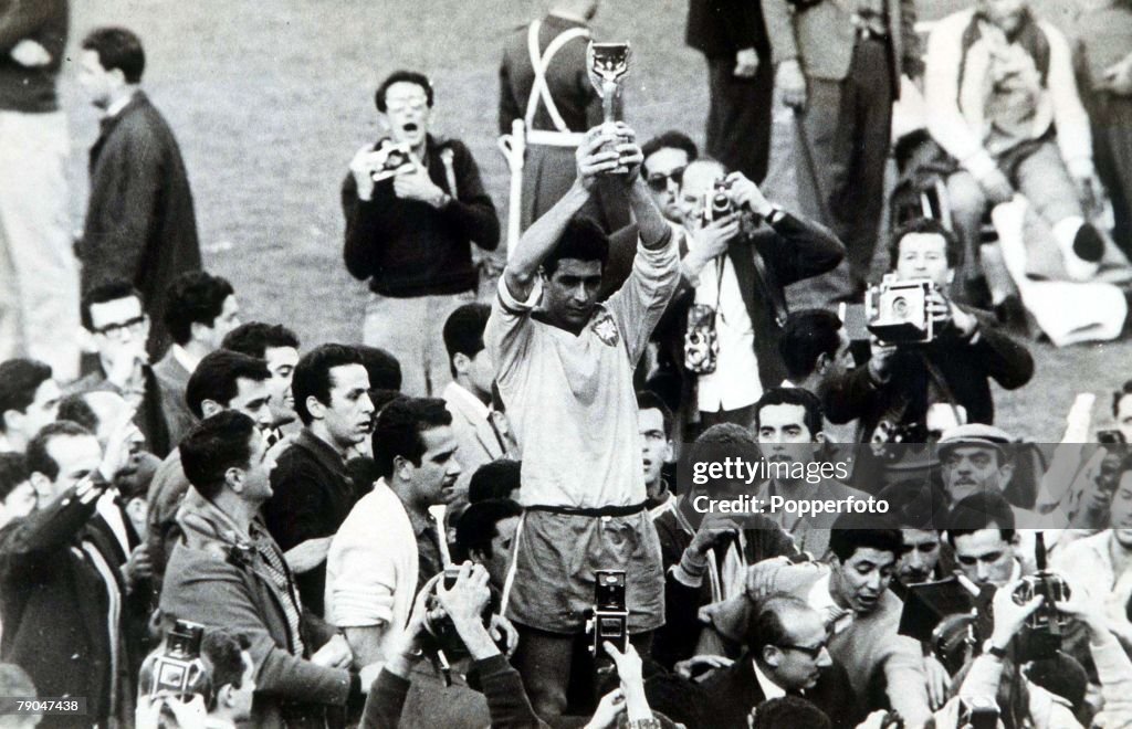World Cup Final, 1962, Santiago, Chile. Brazil 3 v Czechoslovakia 1. 17th June, 1962. Brazilian captain Mauro holds aloft the Jules Rimet trophy after his team defeated Czechoslovakia to win their second consecutive World Cup championship.