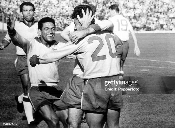 World Cup Final, 1962, Santiago, Chile. Brazil 3 v Czechoslovakia 1. 17th June, 1962. Brazil's Garrincha (left) runs to join in the celebrations after teammate Amarildo (20) had scored thier team's first goal in the Final. World Cup Final, 1962, Santiago, Chile. Brazil 3 v Czechoslovakia 1. 17th June, 1962. Brazil's Garrincha (left) runs to join in the celebrations after teammate Amarildo (20) had scored thier team's first goal in the Final.