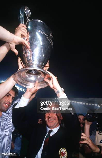 Football, European Cup Final, Vienna, Austria, 23rd May 1990, AC Milan 1 v Benfica 0, AC Milan coach Arrigo Sacchi holds the trophy aloft