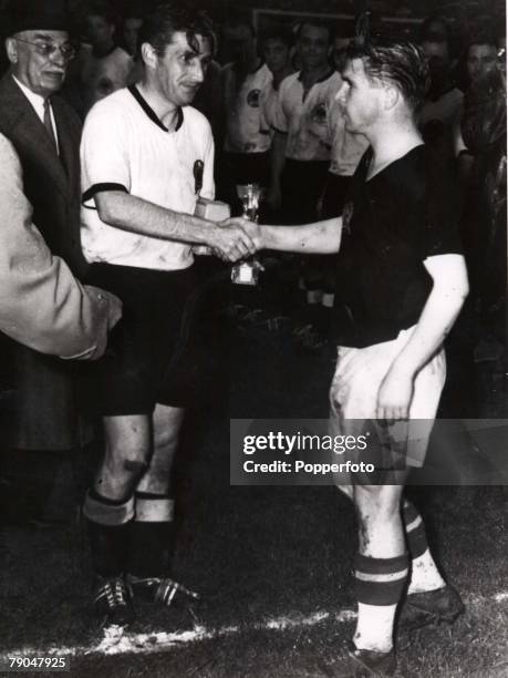 World Cup Final Berne, Switzerland, 4th July West Germany 3 v Hungary 2, West German captain Fritz Walter receives congratulations from Hungarian...