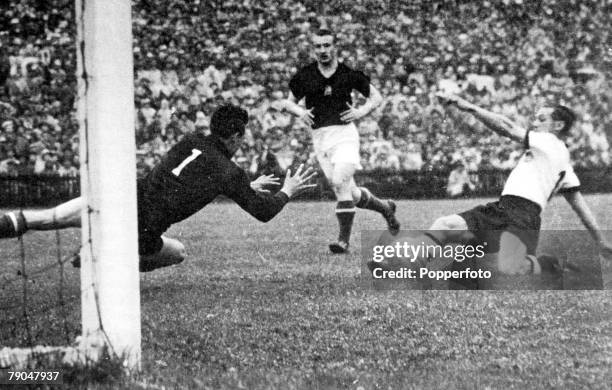 World Cup Final Berne, Switzerland, 4th July West Germany 3 v Hungary 2, West Germany's Max Morlock slides home his side's first goal past Hungarian...