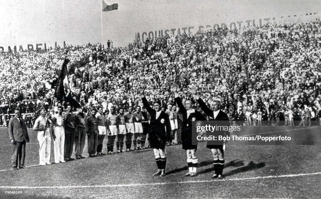 1934 World Cup Final. Rome, Italy. Italy 2 v Czechoslovakia 1. 10th June, 1934. Referee Ecklind of Sweden with linesman Birlem of Germany and Ivancics of Hungary give the Nazi salute prior to kick-off.