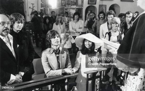 St, Tropez, France, 12th May, 1971 Rolling Stones lead singer Mick Jagger sits next to his Nicaraguan bride Bianca Pérez-Mora Macías during their...