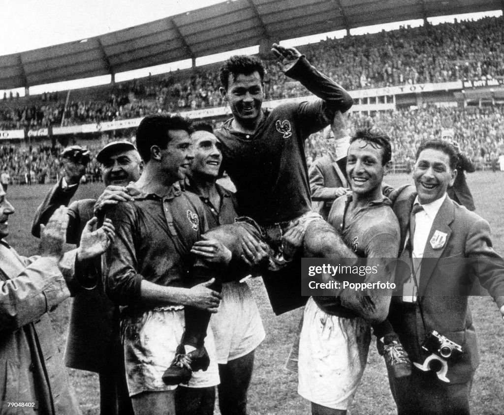 1958 World Cup Third Place Play-Off. Gothenburg, Sweden. 28th June, 1958. France 6 v West Germany 3. France's Just Fontaine is carried by his teammates at the end of the match after scoring four goals to clinch third place for France.