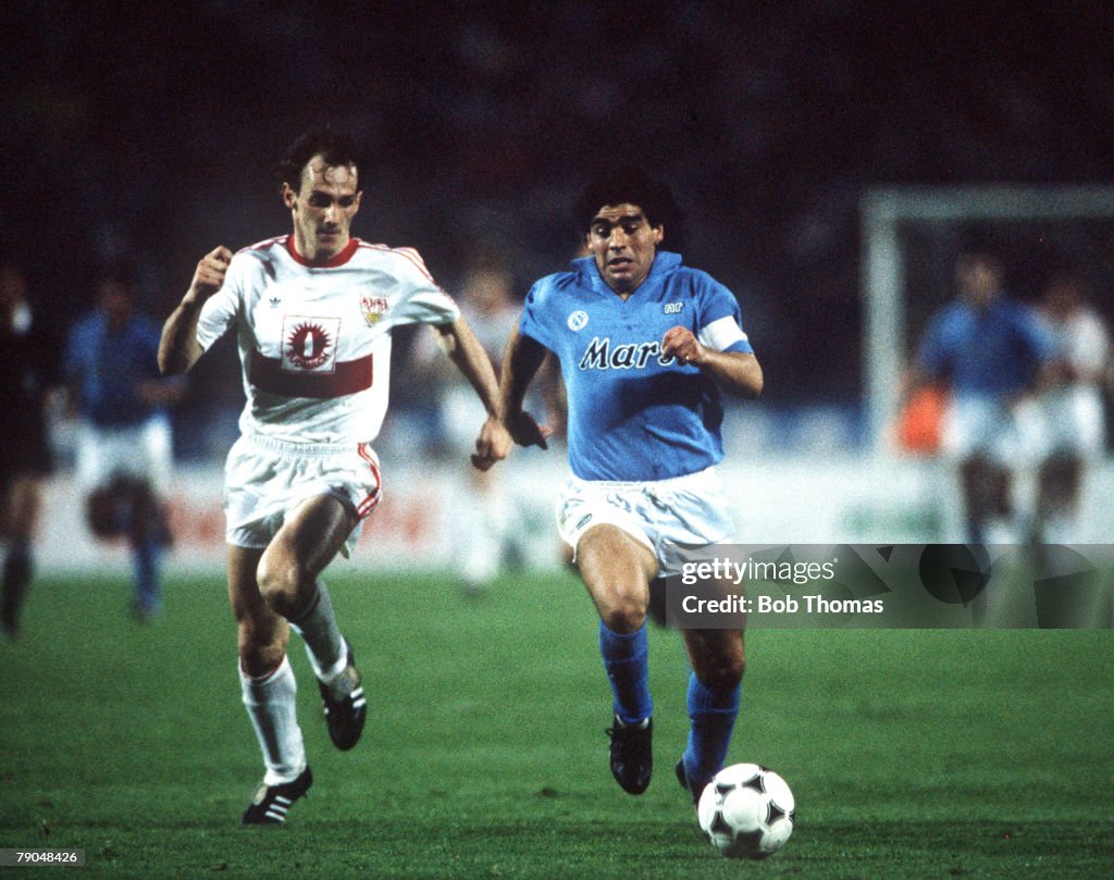 Football. UEFA Cup Final, Second Leg. Naples, Italy. 17th May 1989. Napoli 2 v VfB Stuttgart 1 (Napoli win 5-4 on aggregate). Napoli captain Diego Maradona is chased by a Stuttgart defender.