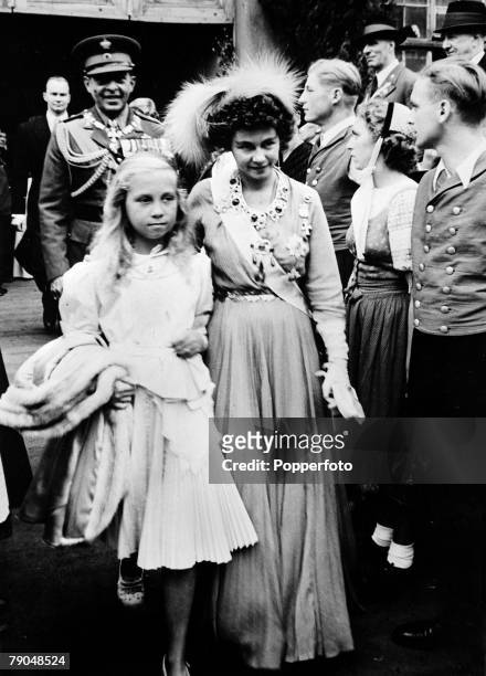 Circa 1940's, Queen Friederika, born 1917, pictured with her daughter Princess Sophia with King Paul behind, Queen Friederika of German descent...