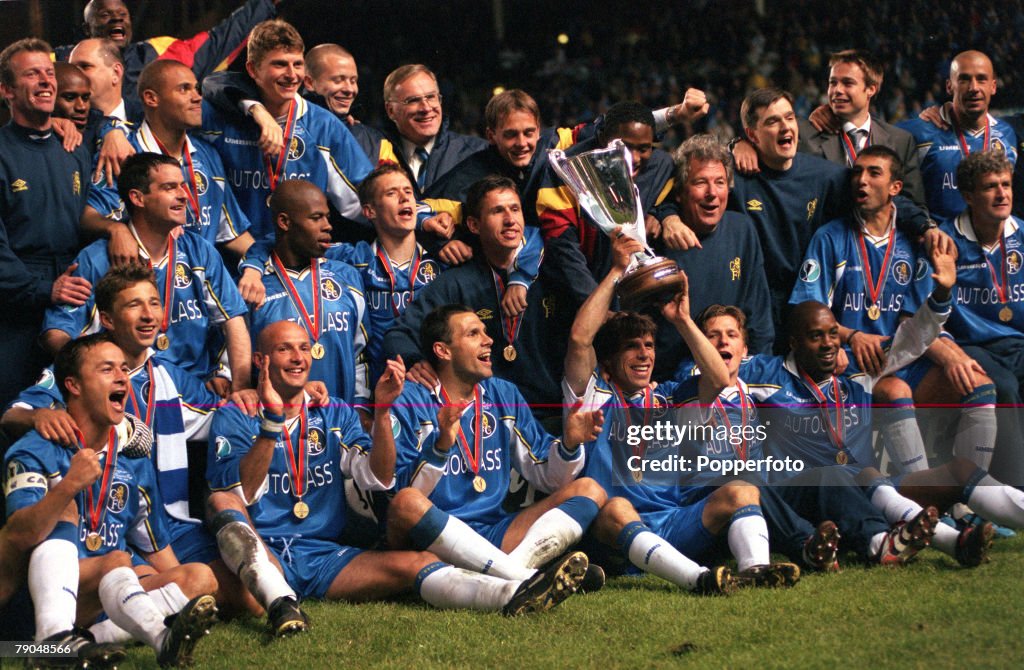 Football. UEFA Cup Winners Cup Final. Stockholm, Sweden. 13th May 1998. Chelsea 1 v Stuttgart 0. Chelsea substitute Gianfranco Zola, who scored the winning goal, holds the trophy aloft as he celebrates with the rest of the team and officials.