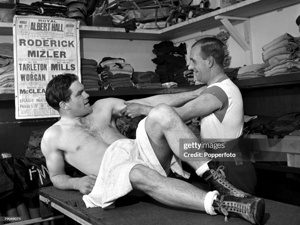 Sport. Boxing. England. 1941. Sgt. Freddie Mills of the RAF with his physiotherapist. Freddie later became Light Heavyweight World Boxing Champion