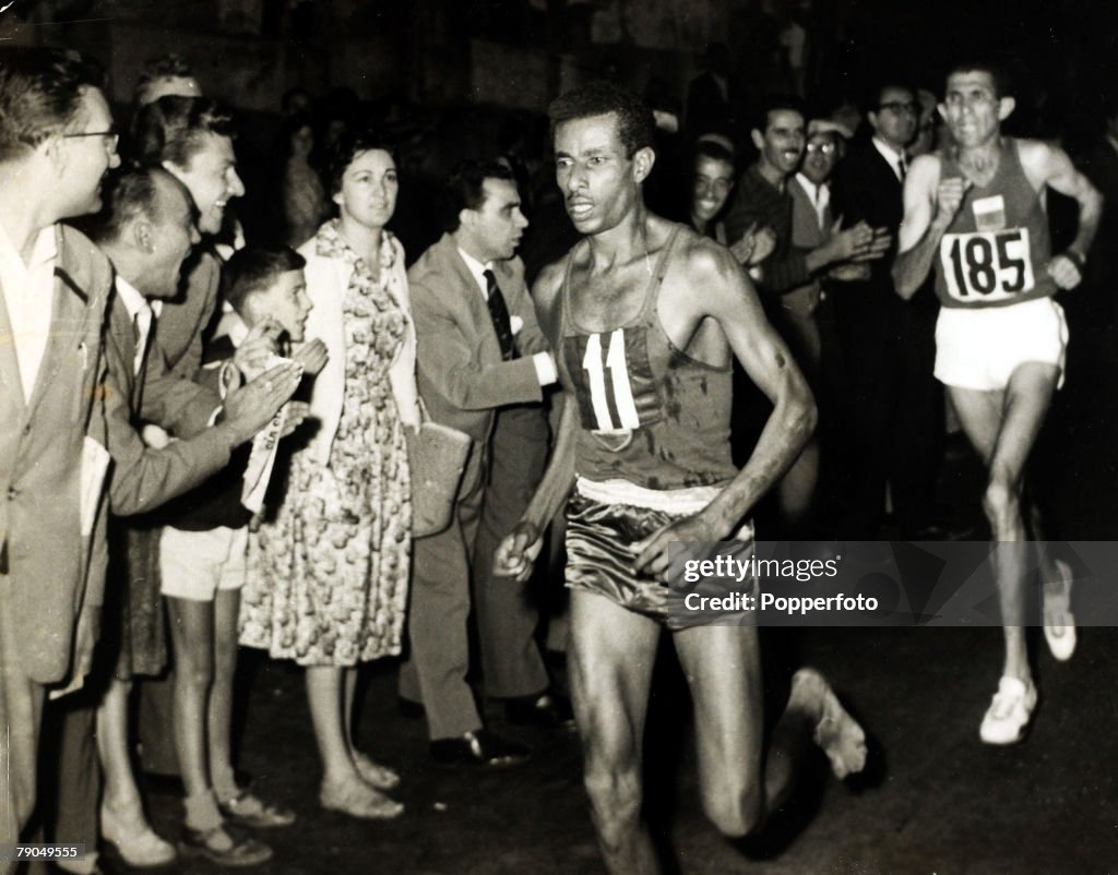 Sport. Athletics. 1960 Olympic Games. Rome, Italy. 10th September 1960. Ethiopia's Abebe Bikila, front, on his way to winning the Gold medal in the Marathon race.