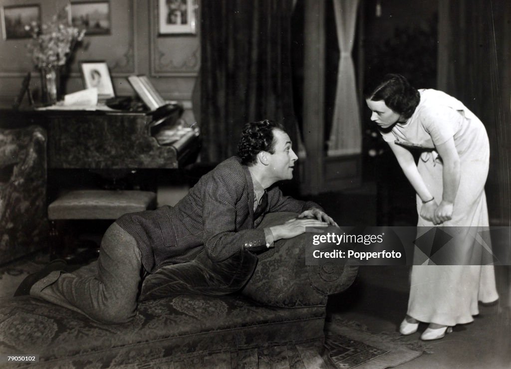 Theatre. Personalities. England. pic: 1934. Film and stage star, British actor Brian Aherne, (1902-1986) appearing with Jessica Tandy in a scene from "Birthday" at the Cambridge Theatre.