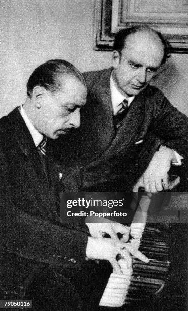 Igor Fyodorovich Stravinsky, , The US composer is pictured at the piano with Wilhelm Furtwangler , the German conductor