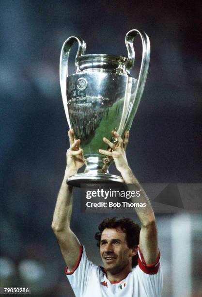 24th May 1989, European Cup Final, Barcelona, Spain, A,C,Milan 4 v Steaua Bucharest 0, Franco Baresi, the A,C,Milan captain holds aloft the giant...