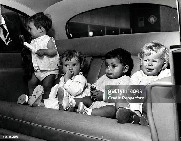 Classic Collection. Page 21. 10374621. Birmingham, England. 23rd May 1968. Four babies, one standing, one crying, on the back seat of a car on their way to a Baby of the Year award ceremony. Classic Collection. Page 21. 10374621. Birmingham, England. 23rd May 1968. Four babies, one standing, one crying, on the back seat of a car on their way to a Baby of the Year award ceremony.