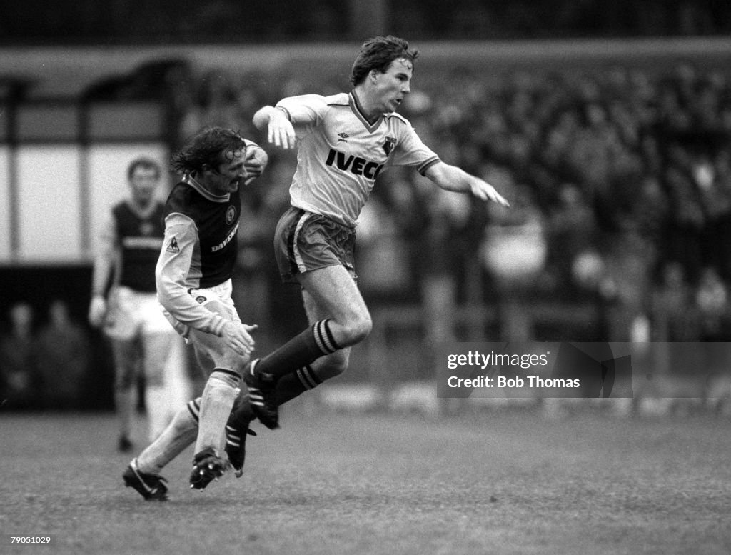 Football. English League Division One. 16th October 1982. Aston Villa 3 v Watford 0. Watford's Kenny Jackett clashes with Villa's Des Bremner.