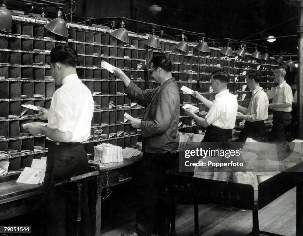 Classic Collection, Page 45 Group of Clerks distributing letters into sorting boxes at the General Post Office, USA New York