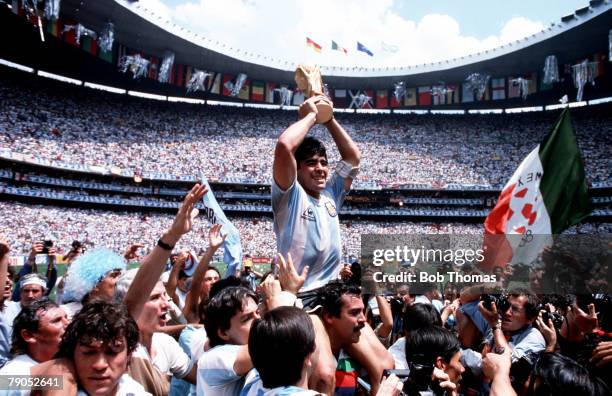 Volume 2, Page 13, Picture 4 Sport, Football World Cup Final, , Argentina Captain, Diego Maradona holds the World Cup trophy whilst being carried on...