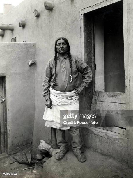 Classic Collection, Page 131 The American Indian Governor of Taos, New Mexico, standing in doorway, U,S,A