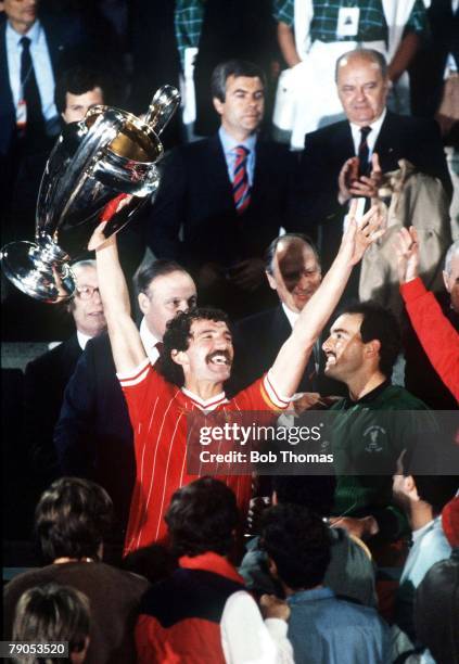 30th MAY 1984, European Cup Final, Rome, Italy, Liverpool 1 v Roma 1, , Liverpool captain Graeme Souness holds aloft the European Cup trophy after...