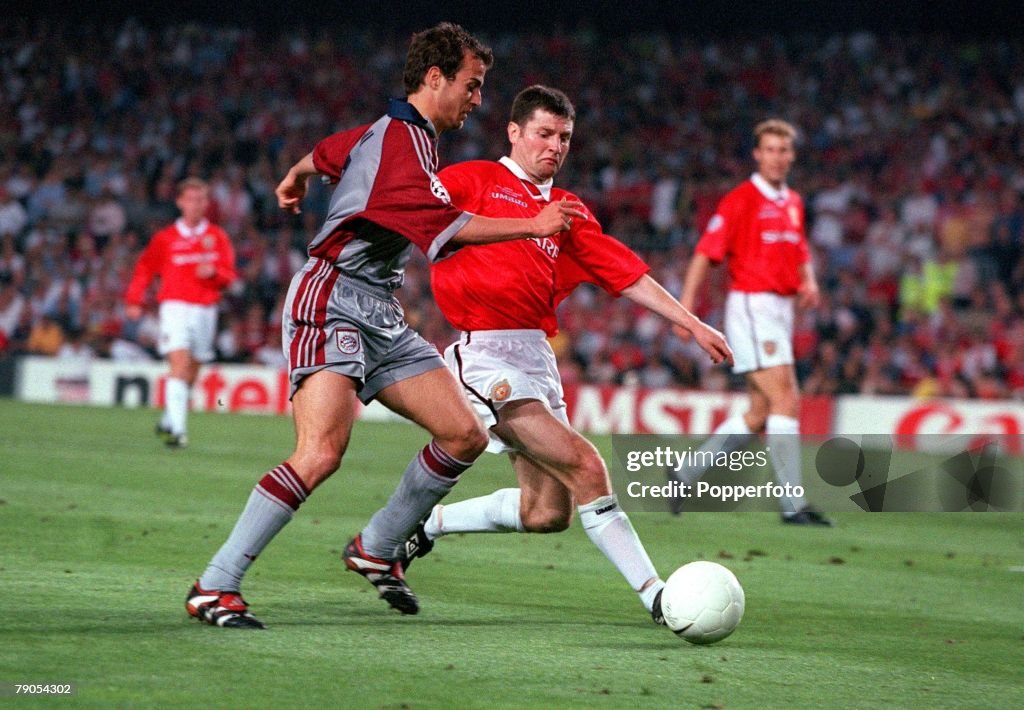 26th MAY 1999. UEFA Champions League Final. Barcelona, Spain. Manchester United 2 v Bayern Munich 1. Bayern Munich's Mehmet Scholl is beaten to the ball by Manchester United's Denis Irwin