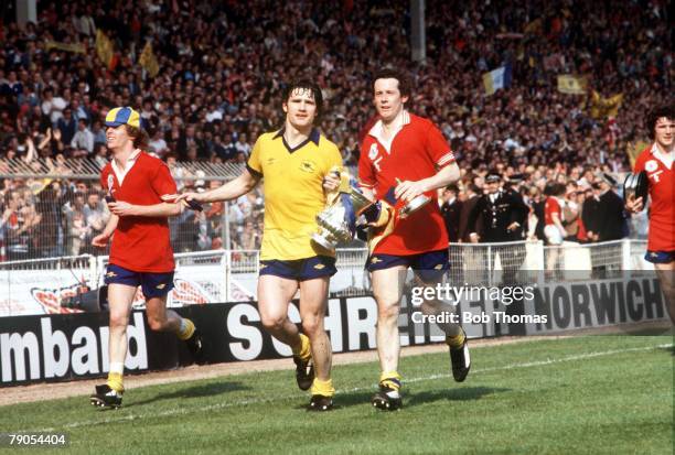 12th May 1979, Wembley, London, England, FA Cup Final, Arsenal 3 v Manchester United 2, Arsenal's Graham Rix, Pat Rice and Liam Brady celebrate with...