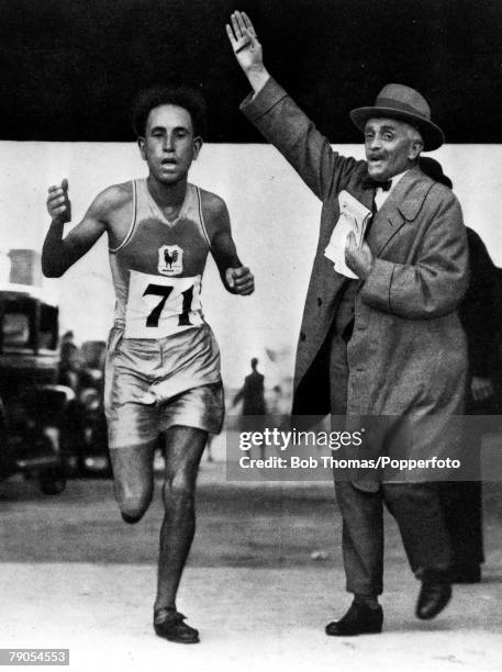 Volume 2, Page 24, Picture 7, Athletics, Track & Field, 1928 Olympic Games, Amsterdam, Holland, Marathon, Mohamed Boughera El Ouafi of France enters...