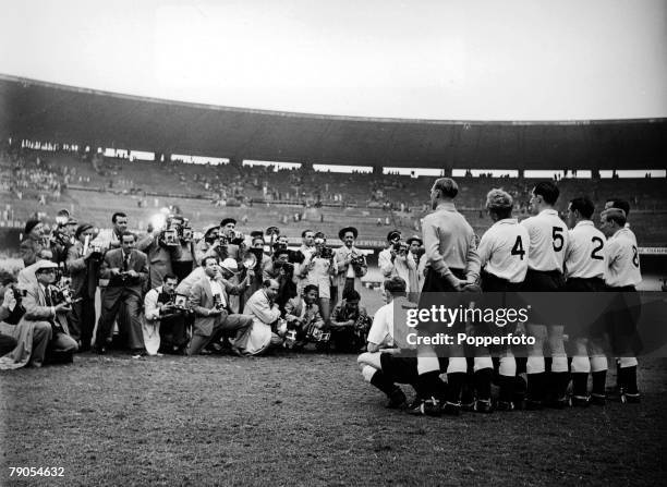 Picture 1, Football, 1950 World Cup Finals, Rio De Janeiro, Brazil. The England team pose as a huge group of photographers take pictures in the...