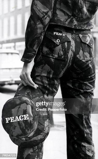 Volume 2, Page 46, Picture 4, 22nd April Sandie Shaw, a top British singer, in -Fashion for Peace+ camouflage trousers outfit