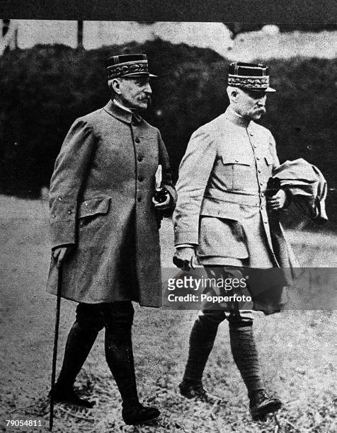 Marshal Henri Phillippe Petain, , French Soldier and Statesman, walks with Marshal Ferdinand Foch , during the battle of the Somme in World War One