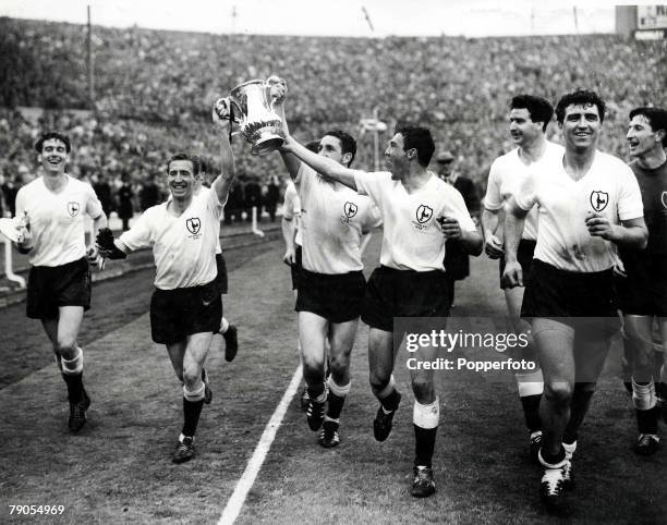 Cup Final 1962, SPURS v BURNLEY , Spurs team runs lap of honour after being presented with the FA Cup by Queen Elizabeth, Players Ron Henry, Cliff...