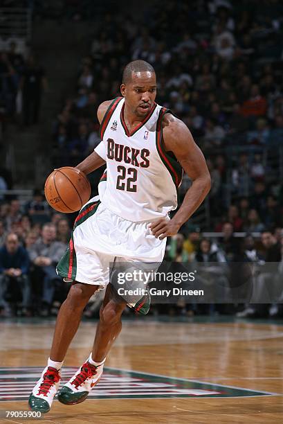 Michael Redd of the Milwaukee Bucks moves the ball against the New Jersey Nets during the game on December 29, 2007 at the Bradley Center in...