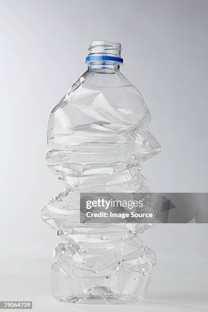 plastic bottle - crush stock pictures, royalty-free photos & images
