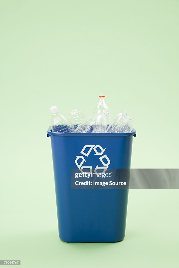 Bottles in a recycling bin