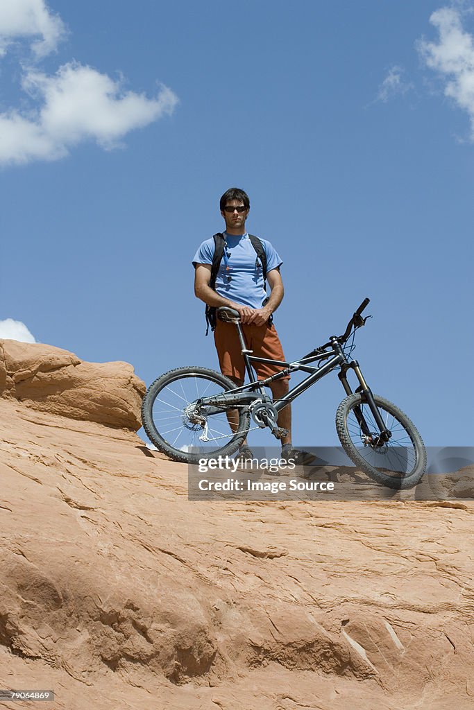 Mountain biker on rock