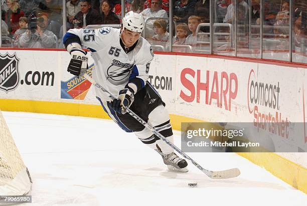 Shane O'Brien of the Tampa Bay Lighting skates with puck during a hockey game against the Washington Capitals on December 26, 2007 at the Verizon...