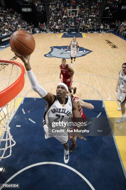 Hakim Warrick of the Memphis Grizzlies shoots a layup during the game against the Houston Rockets at the FedExForum on December 28, 2007 in Memphis,...