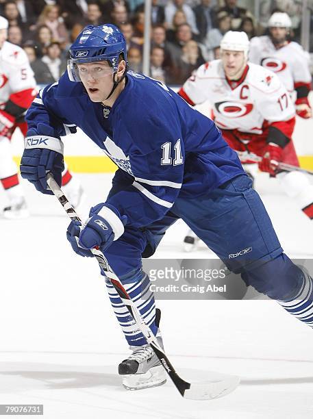 Jiri Tlusty of the Toronto Maple Leafs skates up ice during game action against the Carolina Hurricanes on January 15, 2008 at the Air Canada Centre...