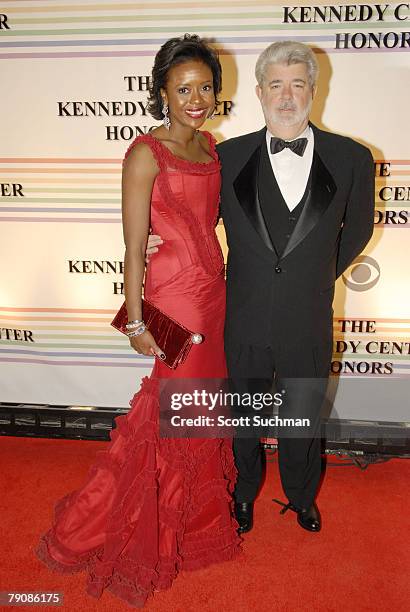 Director George Lucas and Mellody Hobson, in a dress by Peter Sorenen, arrive at the 2006 Kennedy Center Honors Sunday night in Washington DC. The...