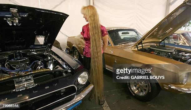 Sue Welsh of Spokane, Whashington inspects her 1968 Shelby GT 500KR that she hopes to sell during the 37th Annual Barrett-Jackson Collector Cars...
