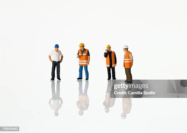models of construction workers. - dolls ストックフォトと画像