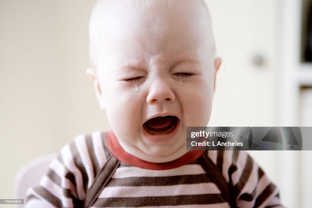 A crying baby.