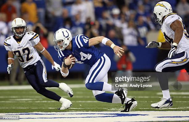 Dallas Clark of the Indianapolis Colts runs for yards after the catch against Eric Weddle of the San Diego Chargers during their AFC Divisional...