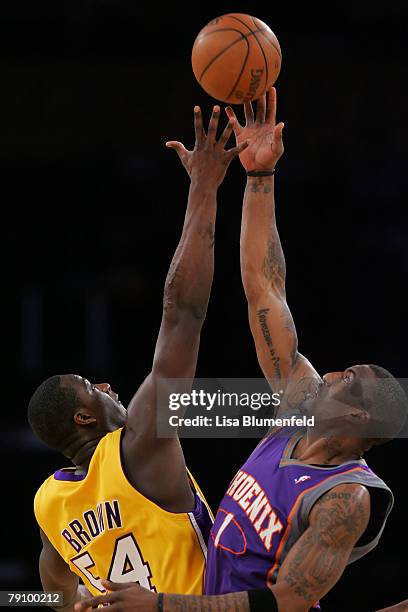 Kwame Brown of the Los Angeles Lakers and Amare Stoudemire of the Phoenix Suns tip-off to start the game at Staples Center on January 17, 2008 in Los...