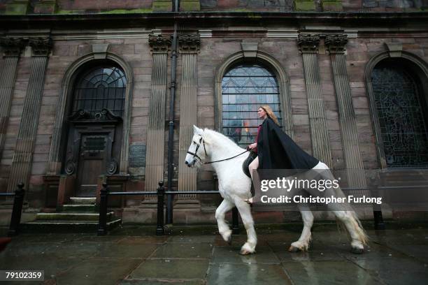 Stunt rider Emily Cox rides her horse Legend through St Ann's Square recreating the historical ride of Lady Godiva on January 18, 2008 in Manchester,...