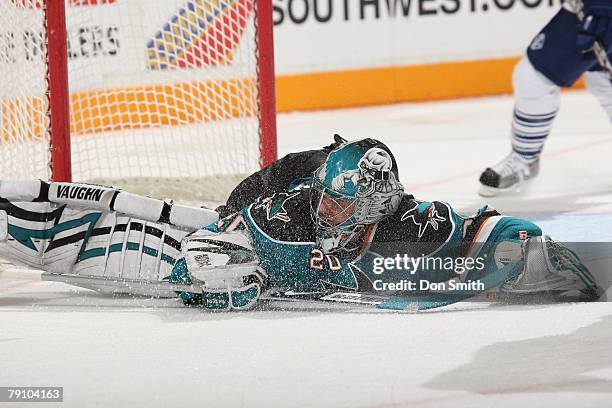 Evgeni Nabokiv of the San Jose Sharks make a big save during an NHL game vs the Toronto Maple Leafs on January 12, 2008 at HP Pavilion at San Jose in...