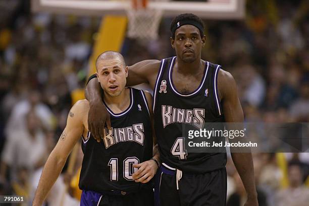 Chris Webber walks upcourt with Mike Bibby of the Sacramento Kings in Game six of the Western Conference Finals against the Los Angeles Lakers during...