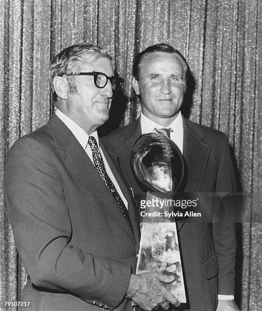 Miami Dolphins head coach Don Shula and team owner Joe Robbie are presented the Vince Lombardi trophy after a 14-7 win over the Washington Redskins...