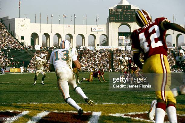 Miami Dolphins safety Jake Scott intercepts a pass in the intended for Redskins Charley Taylor in a 14-7 win over the Washington Redskins in Super...