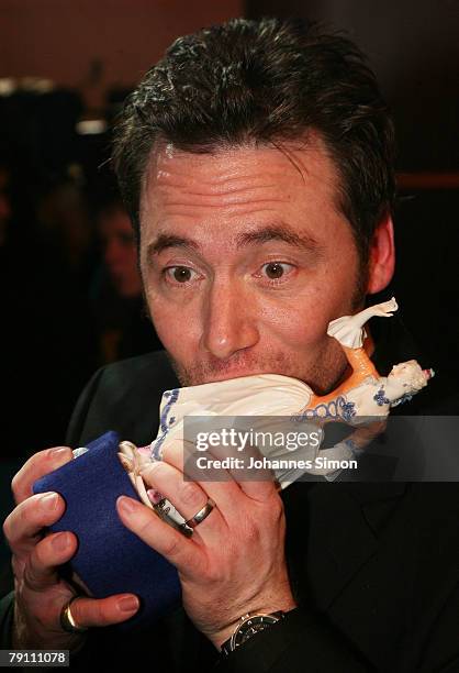 German actor Michael Bully Herbig poses on stage after the awarding ceremony of the Bavarian Film Awards on January 18, 2008 in Munich, Germany.